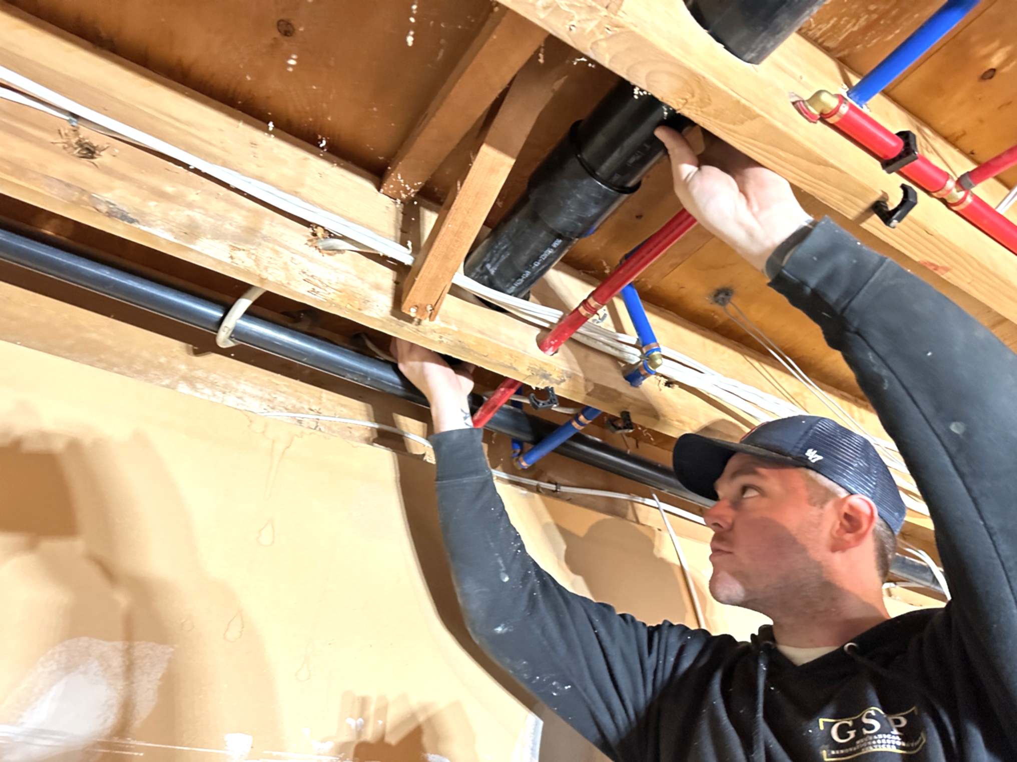 Our employee troubleshoots problems with poly-b
