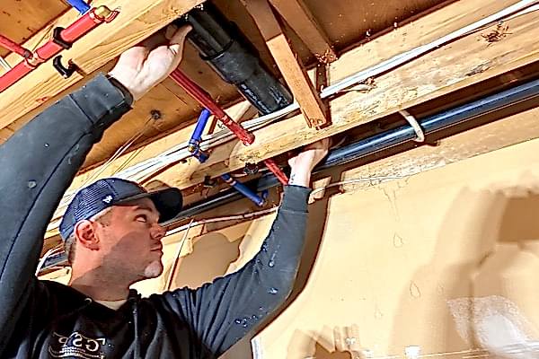 GSP Services plumber checks for leaks